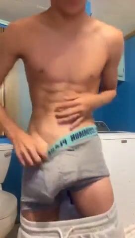Cute curly twink shows off his cock in 15 seconds