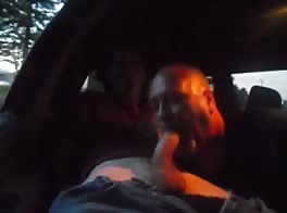 A young cock sucking in the car