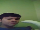 Cute twink plays with banana