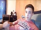 A103. young boy wanks on bed