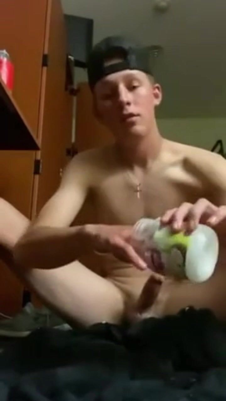 Twink jerks cock in bedroom fun
