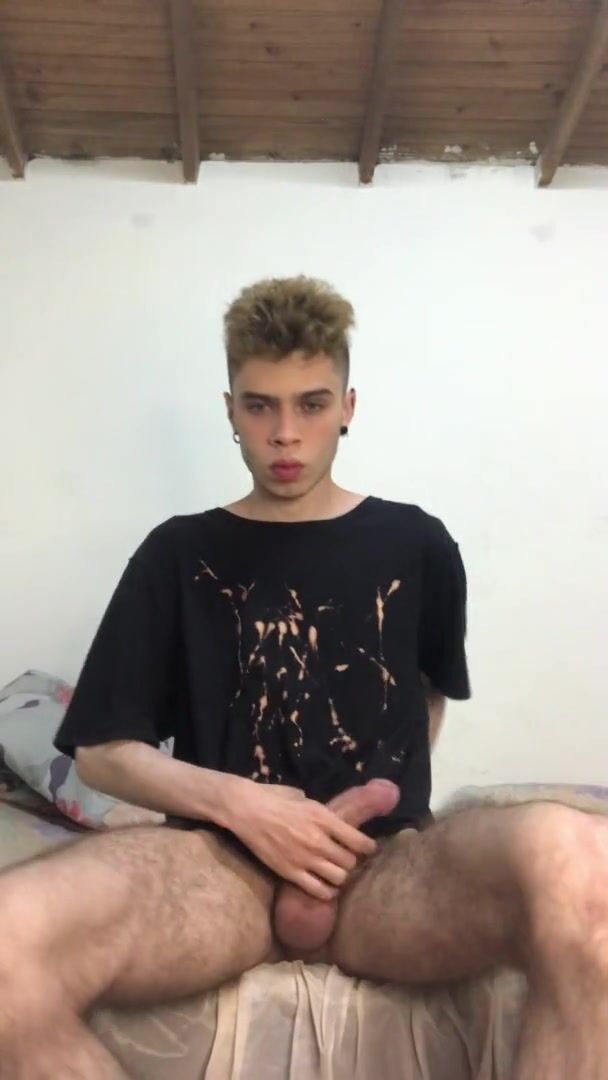 Beautiful twink jerks his hairy legs in room