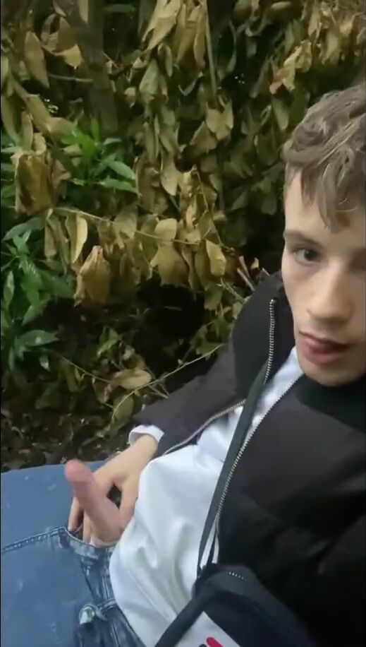 Young twink wanks in the woods
