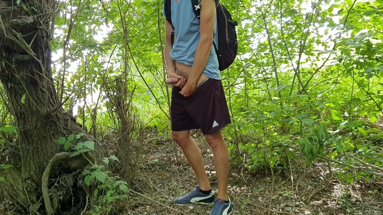 Outdoor twink jerks off and cums