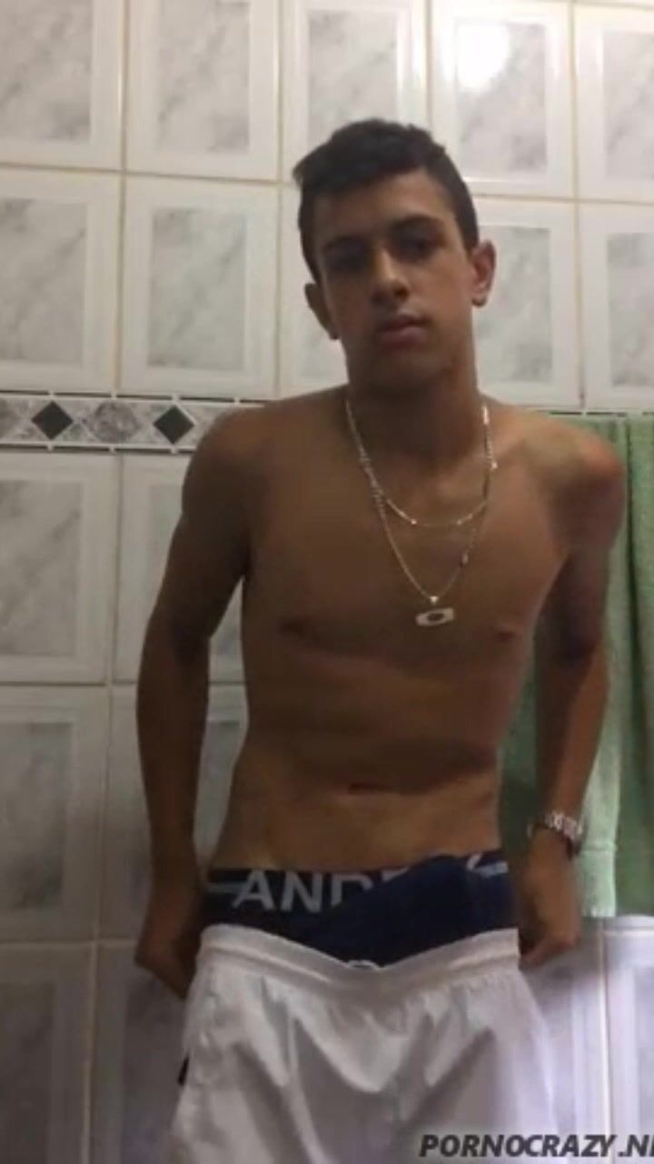 Twink wanks hard cock in bathroom