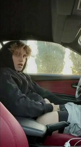 Hot twink jerks off cock in car