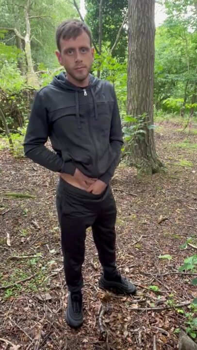 Horny americano jerks his thick cock in the woods until he explodes