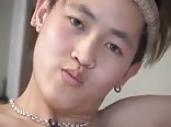 Asian boy jerks his hard cock