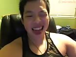 Asian cam boy strokes hard cock