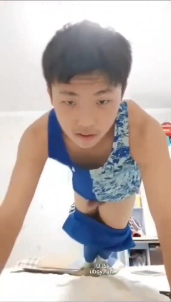 Blue shirt asian jerks his cock