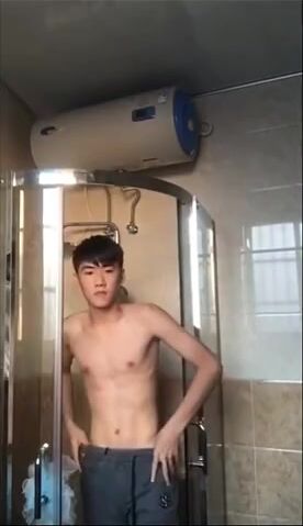 Asian teen twink shower strokes his cock