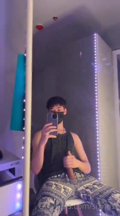 Asian twink flexing his muscles and his big dick