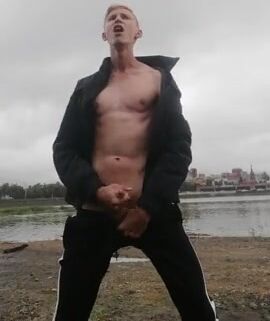 Beautiful twink strips outdoor and cums