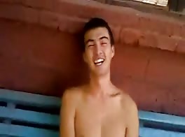 Twink rides muscle daddy bareback on bench