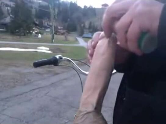 Twink rides bike dildo bareback while daddy watches