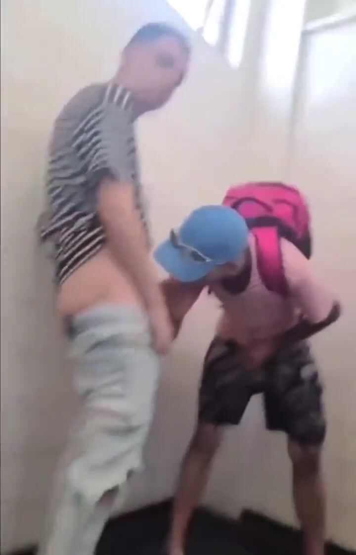 Twink sucks cock in public toilet 2