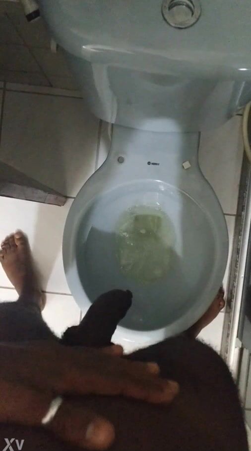 Black mega cock pisses on twink