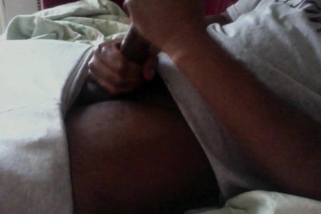 Black teen jock strokes his cock and cums hard