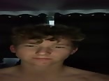 Blond boy jerks his cock in front of mirror