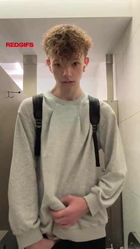 Blond twink strokes in school toilet