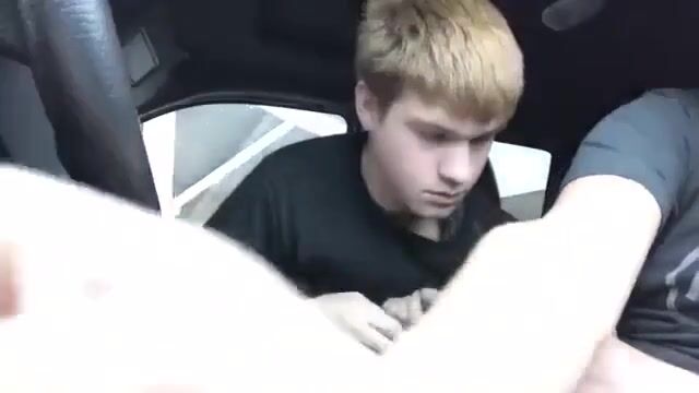 Blond twink gives oral. to friend in his car porn