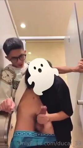 Public restroom blowjob ends in cum