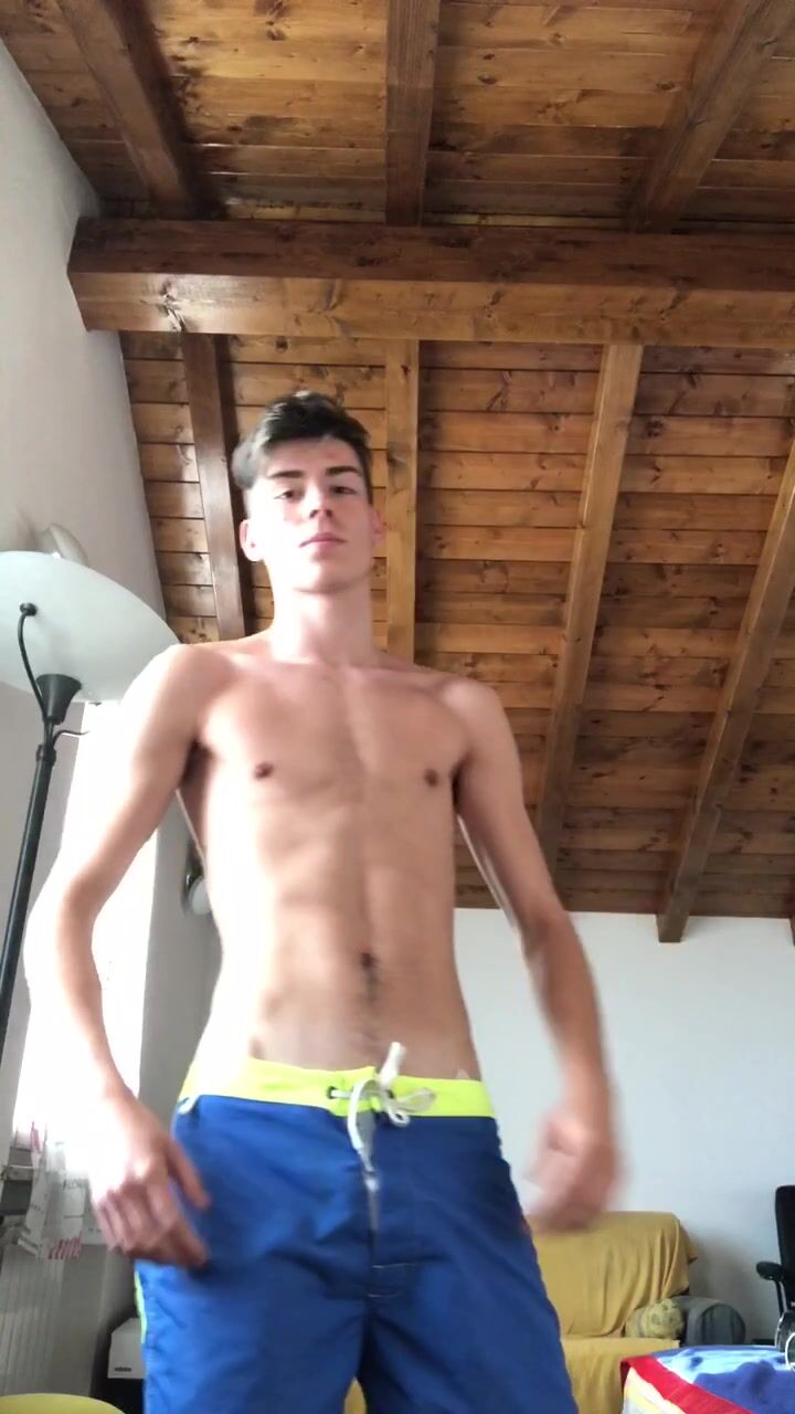 Boy in blue shorts strips twink porn