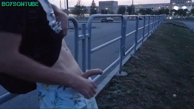 Boy in shorts wanking on the road porn