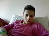 Pink shirt boy yanks his big cock