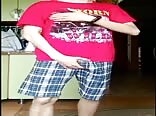 Twink pulls cock from shorts and jacks off