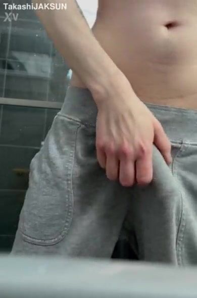 Twink flashes his hard cock in joggers