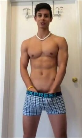 Twink teen strokes his cock at home