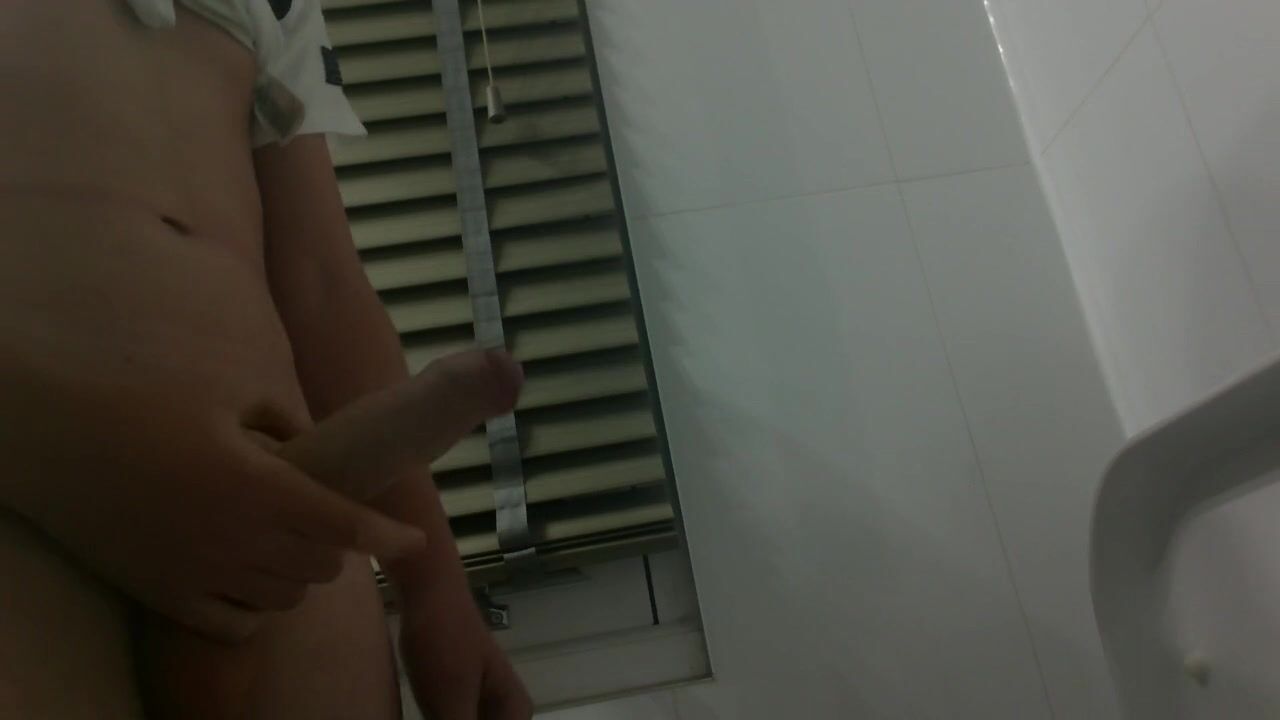 Boy wanks hard then cums in toilet