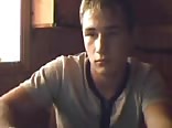 Muscle twink strokes his cock