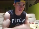 Muscled young jock strips