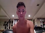 Hot boy plays with sausage