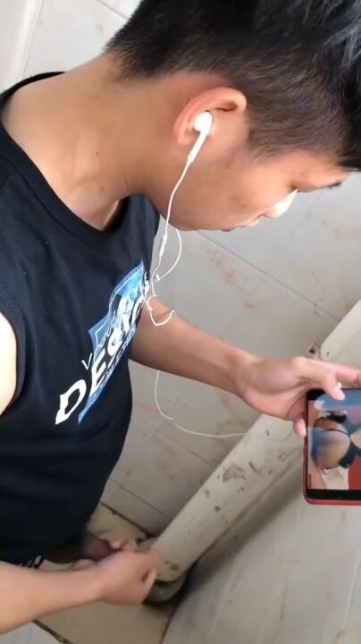 Chinese twink caught in public toilet