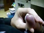 Twink close up stroking his cock and shooting huge load