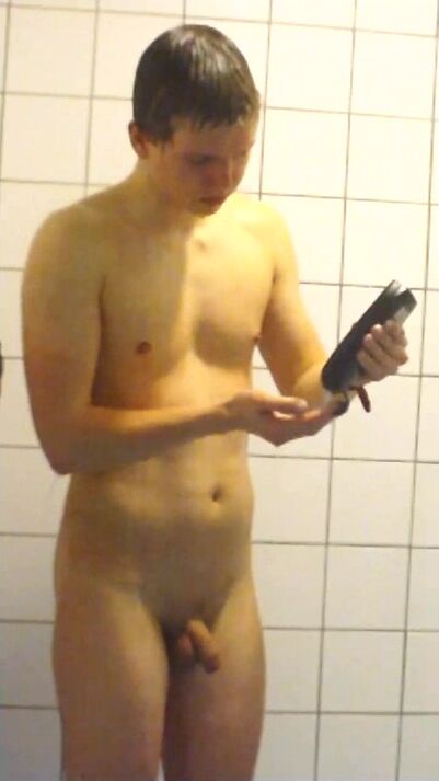 Naked college boy showers hard