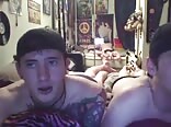 Gay couple relaxing at home on webcam