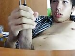 Check-shirt latino teen with big uncut dick cums hard in gay porn