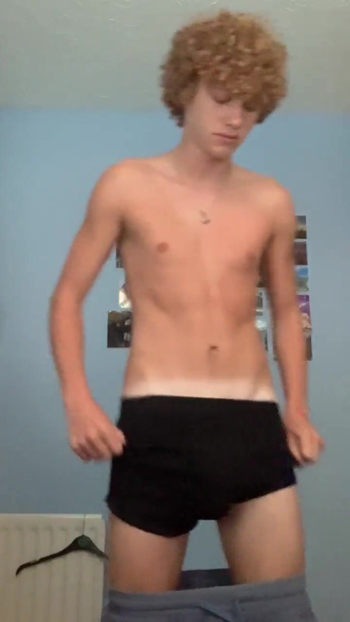 Curly ginger strokes his big cock