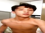 Asian twink wanks hard and blows huge load