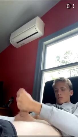 Cute blonde farmer boy wanks on bed for cam