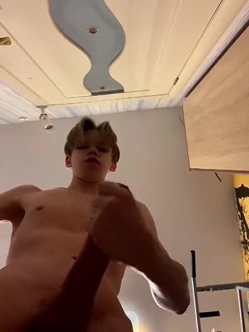 Fit blonde stud jerks his big cock on cam - cumming hard below view