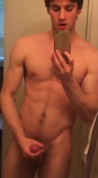 Cute fit twink jerks off in mirror