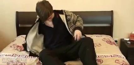 Skinny cute boy displays his body