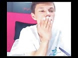 Teen boy plays with dildo on webcam