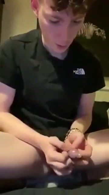 Hung twink fills condom