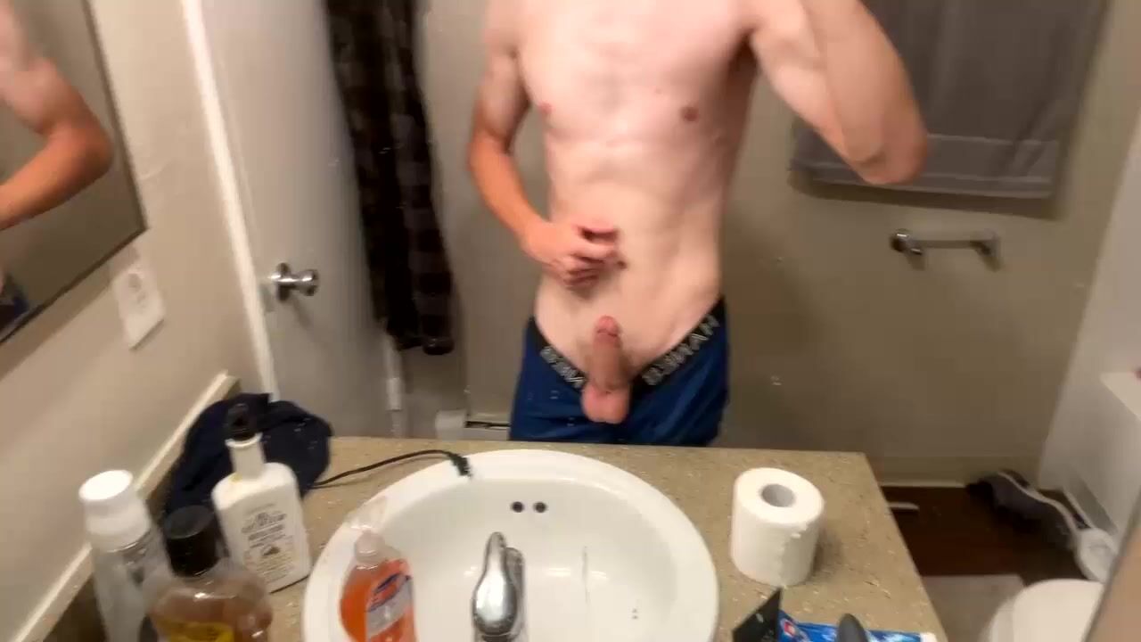 Blond fit twink mirrors his cock show